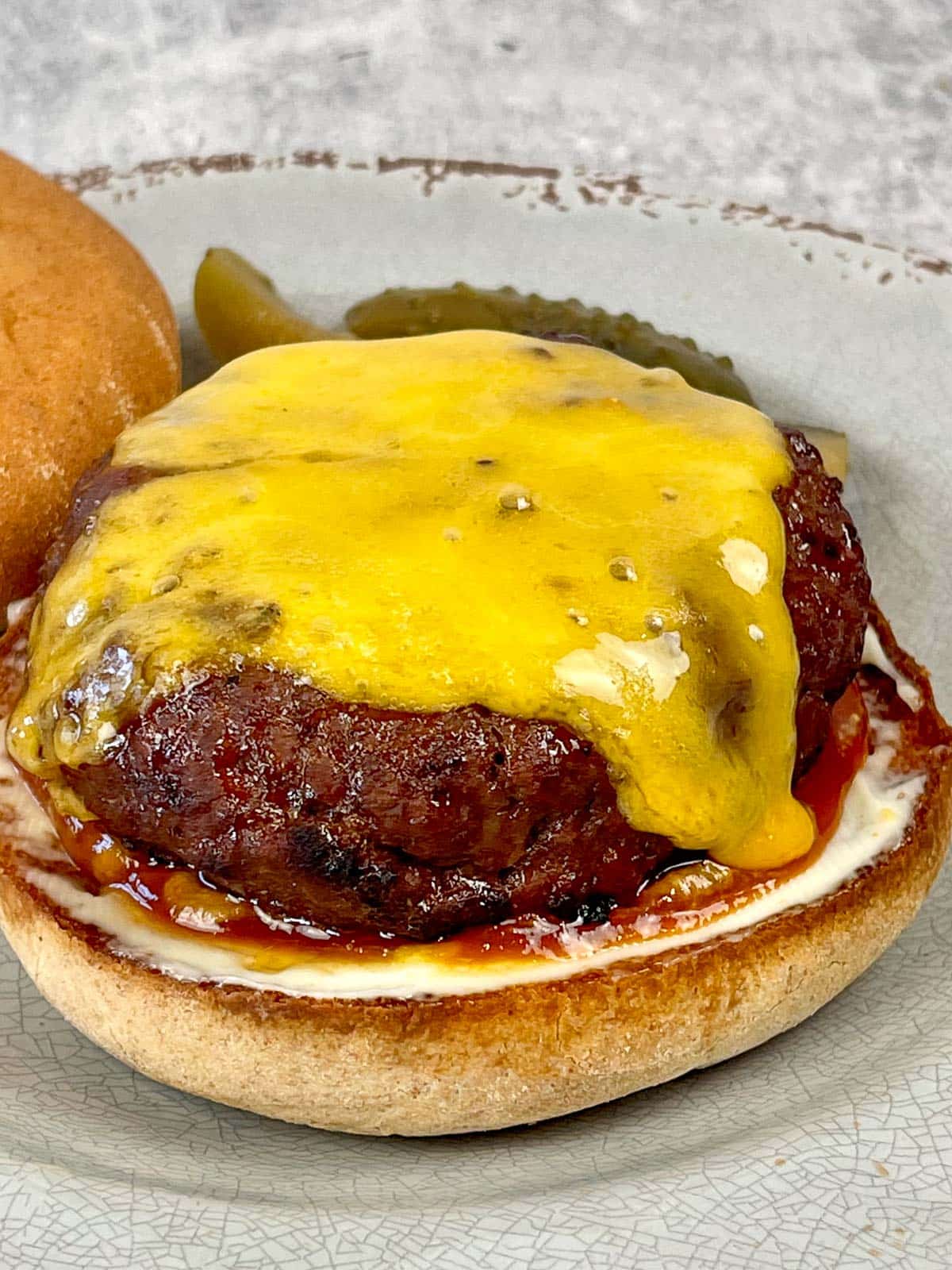 Cheeseburger on a burger roll.