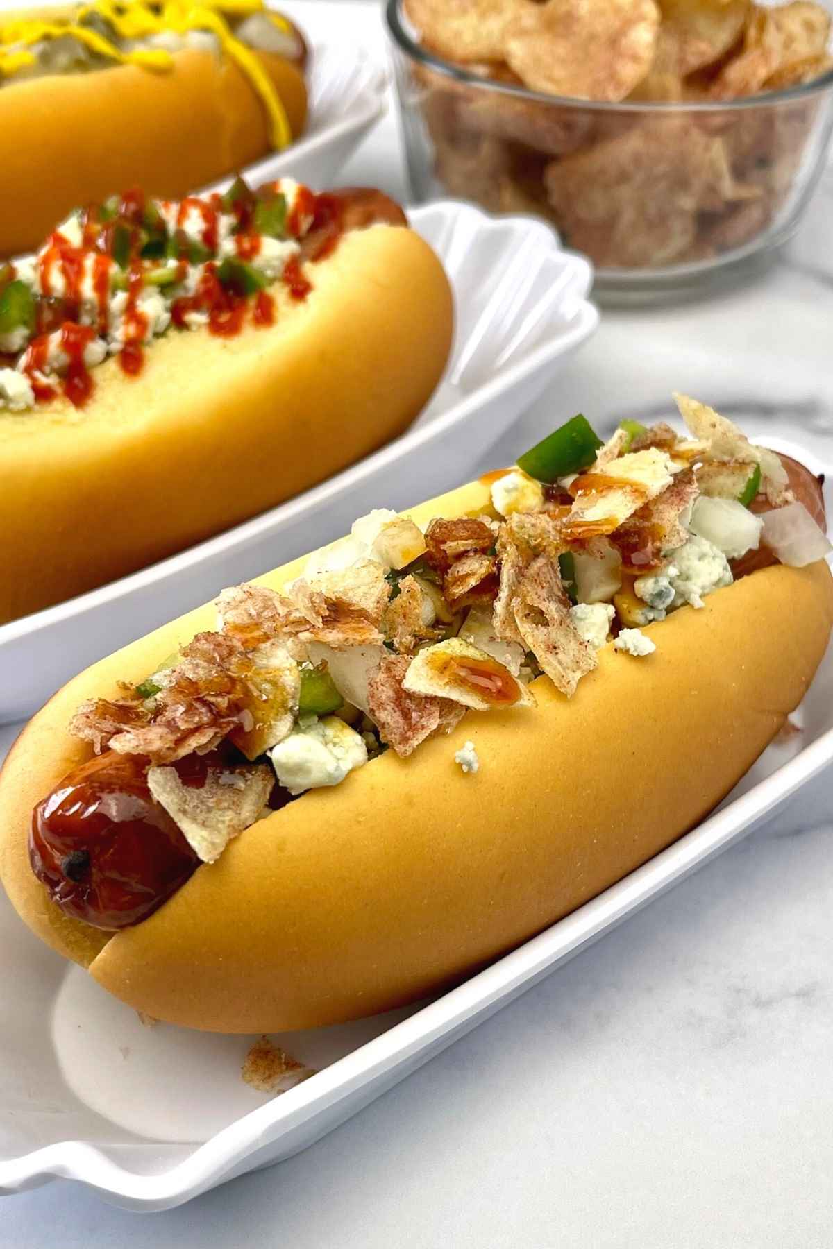 Hot Dog in a roll with a combination of toppings.