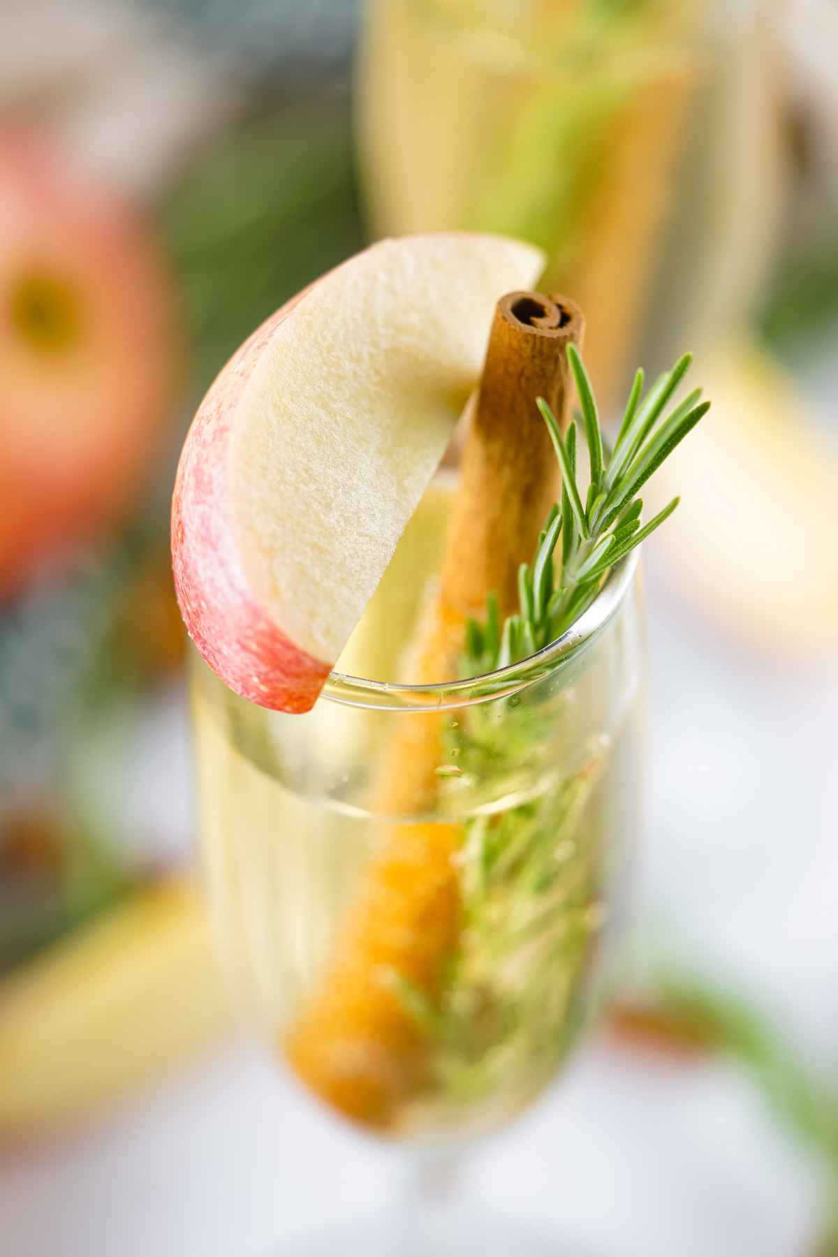 Upclose overhead image of apple cider mimosa drink.