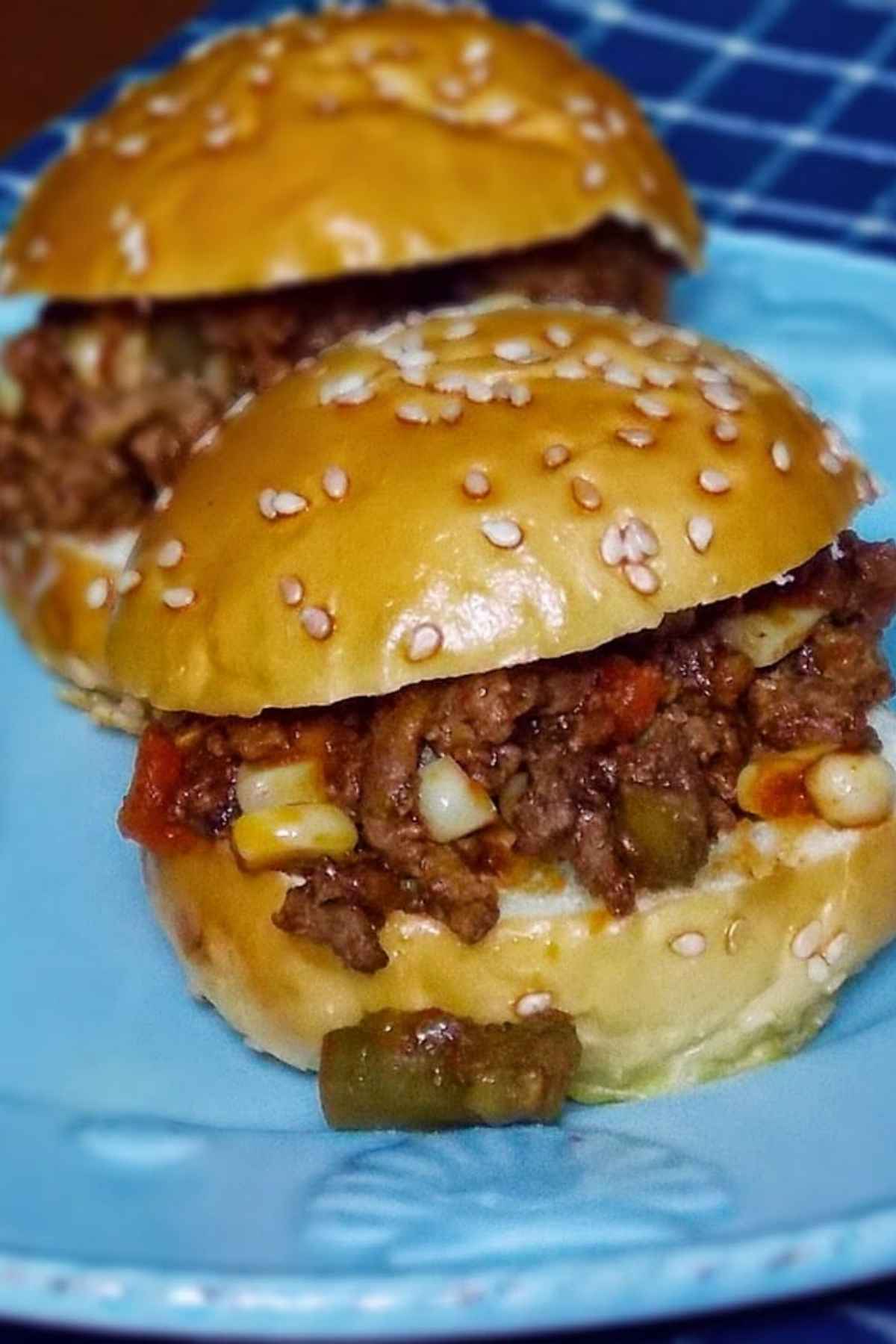 Slow Cooker Beef and Veggie Sliders on a blue plate.