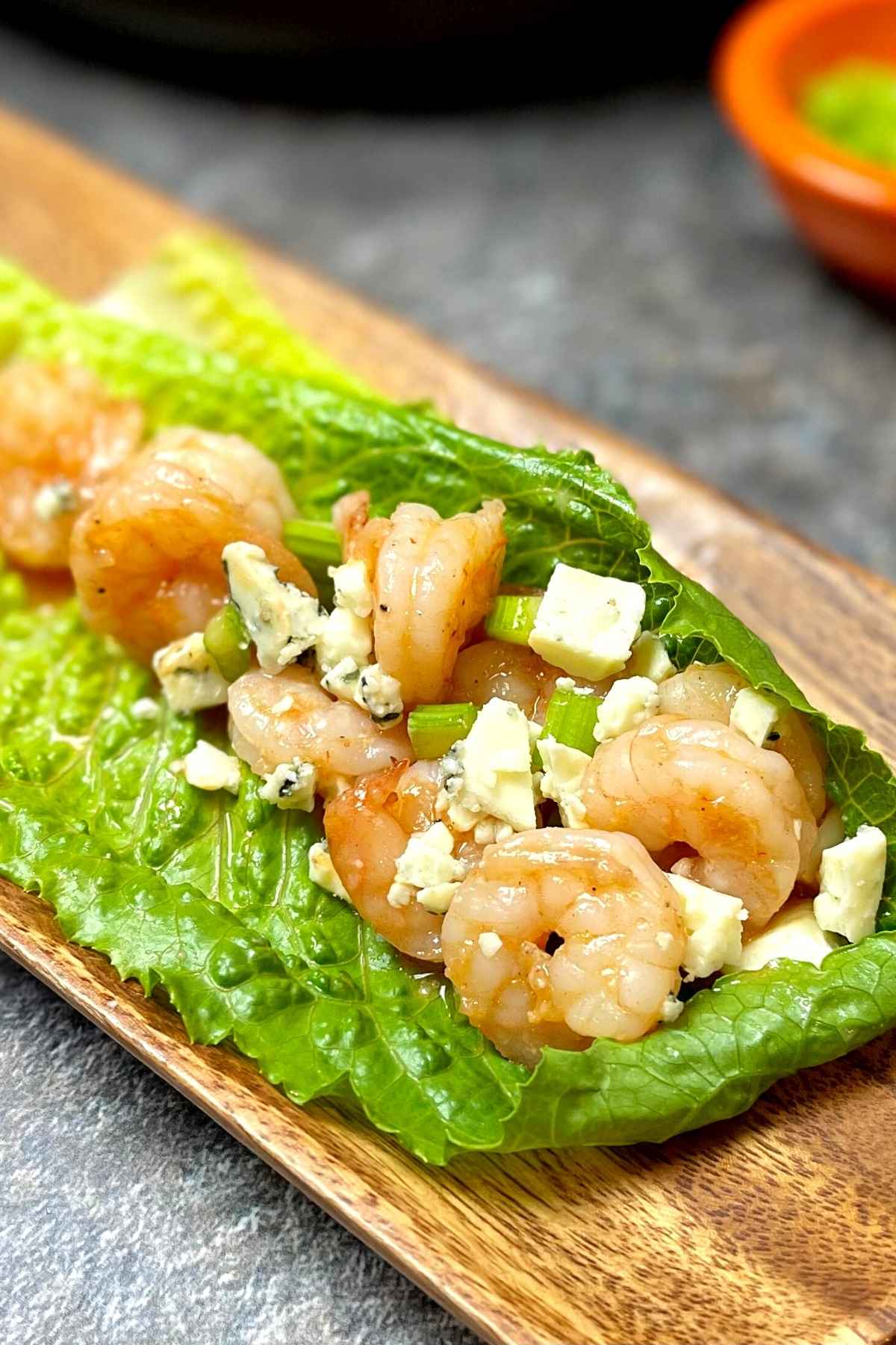 Buffalo Shrimp Lettuce wraps on an appetizer tray.