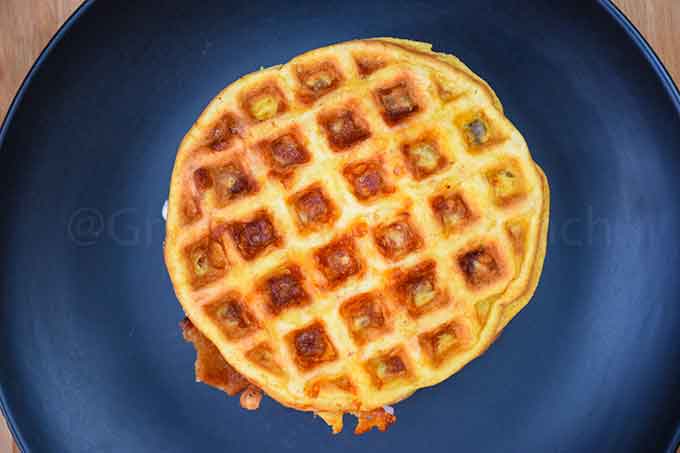 1 chaffle on a black plate