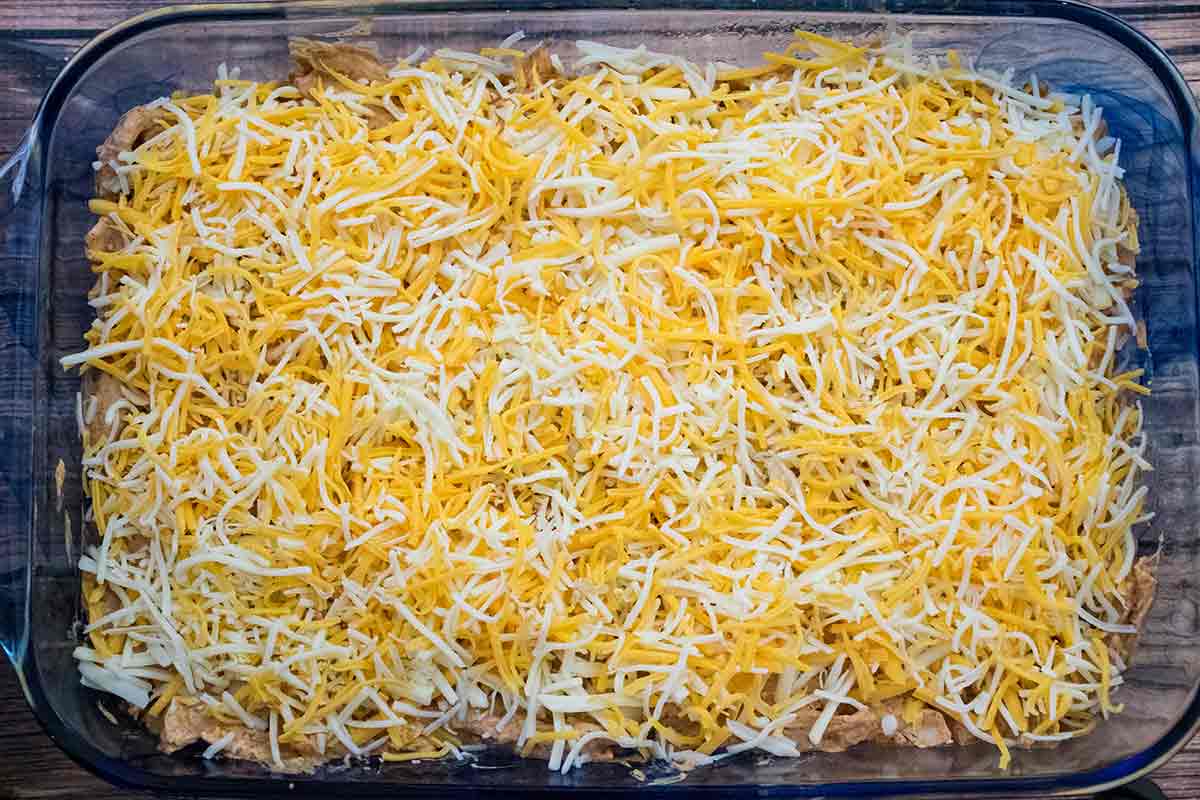 Overhead shot of unbaked assembled casserole.