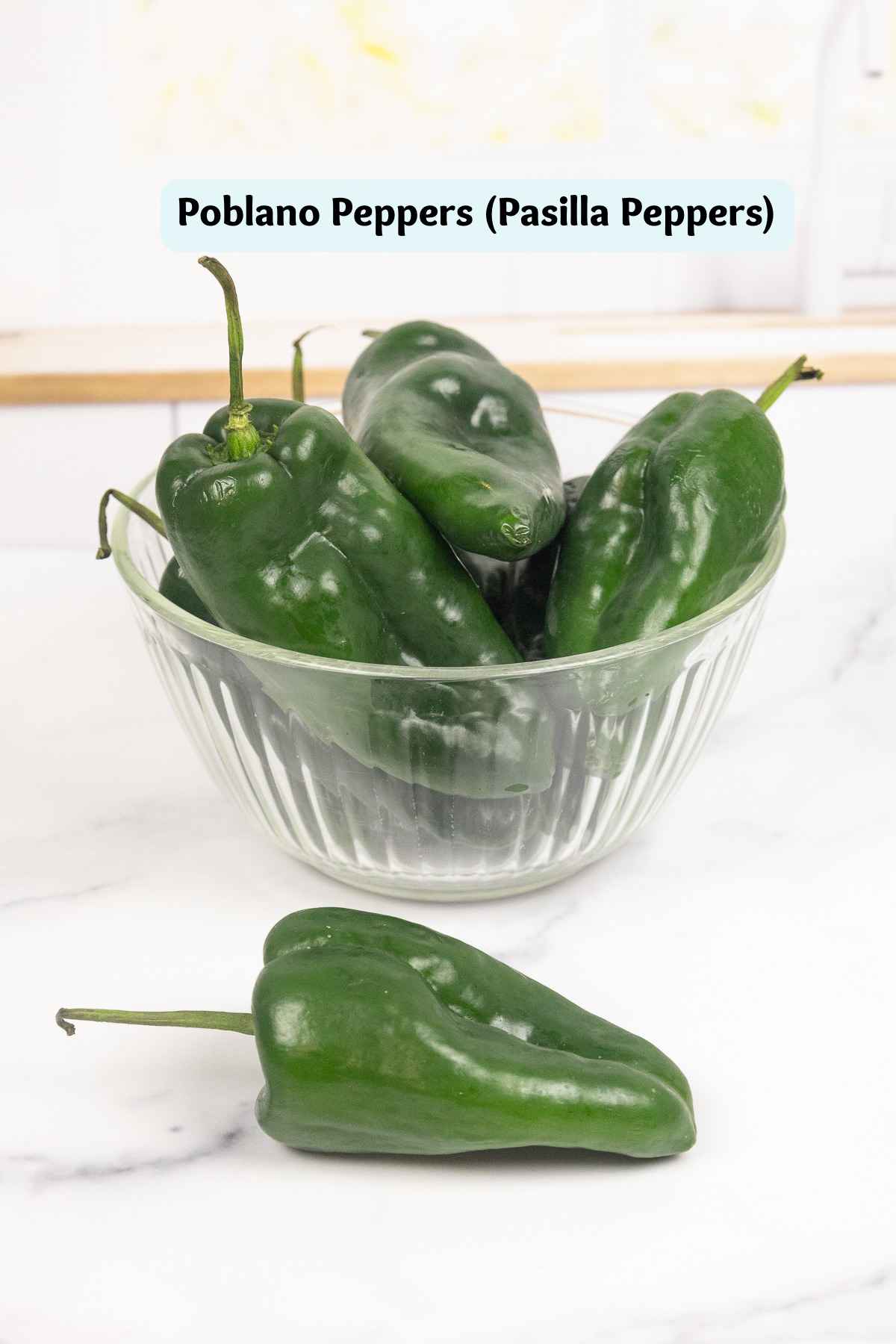 A bowl of fresh poblano peppers