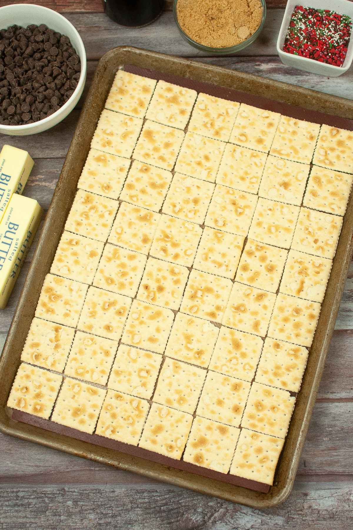 Crackers on a jelly roll pan.