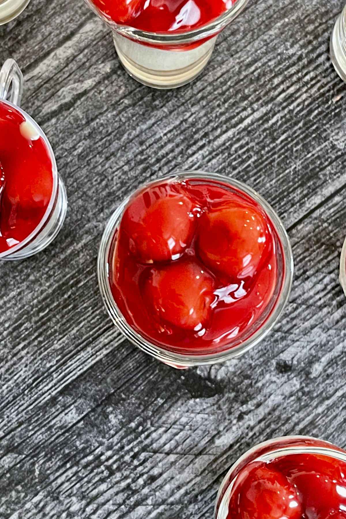 Overhead image of Fireball Cheesecake Shots in shooter glasses.