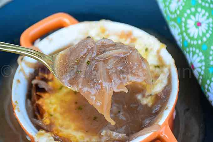 A spoonful of onion soup.