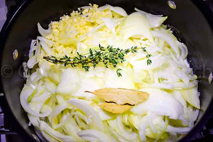 Herbs and onions simmering in the stock pot.