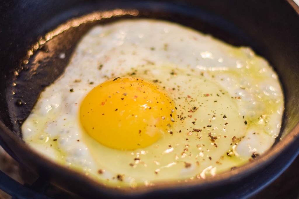 egg frying in skillet