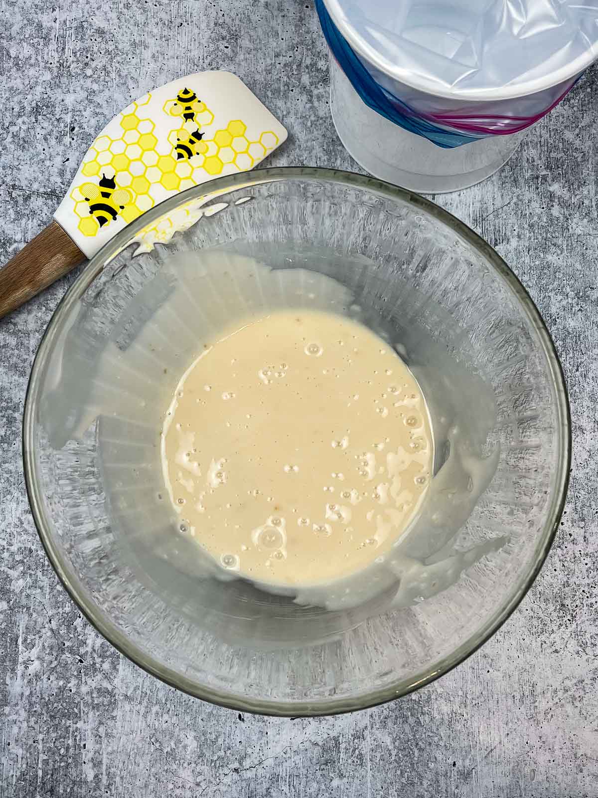 Maple frosting in a mixing bowl.