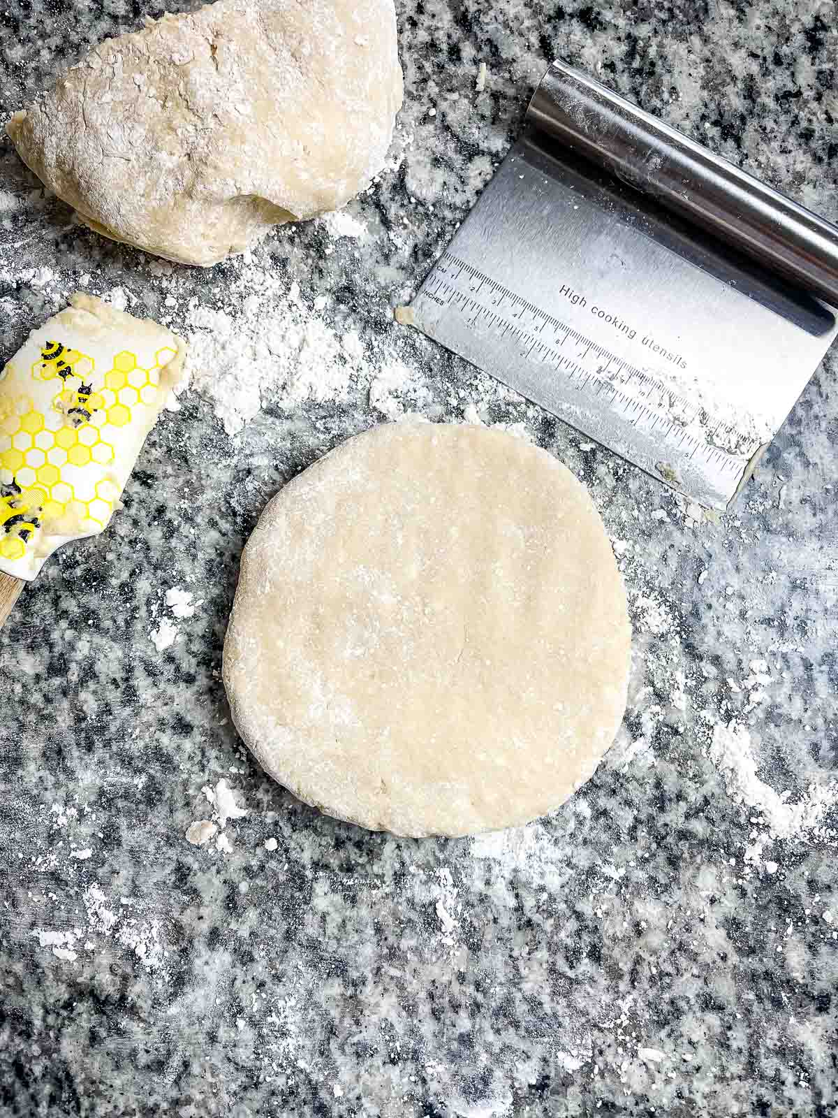 Dough on a floured surface ready to cut into triangles.