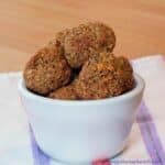 Baked Millet Meatballs in a white bowl.