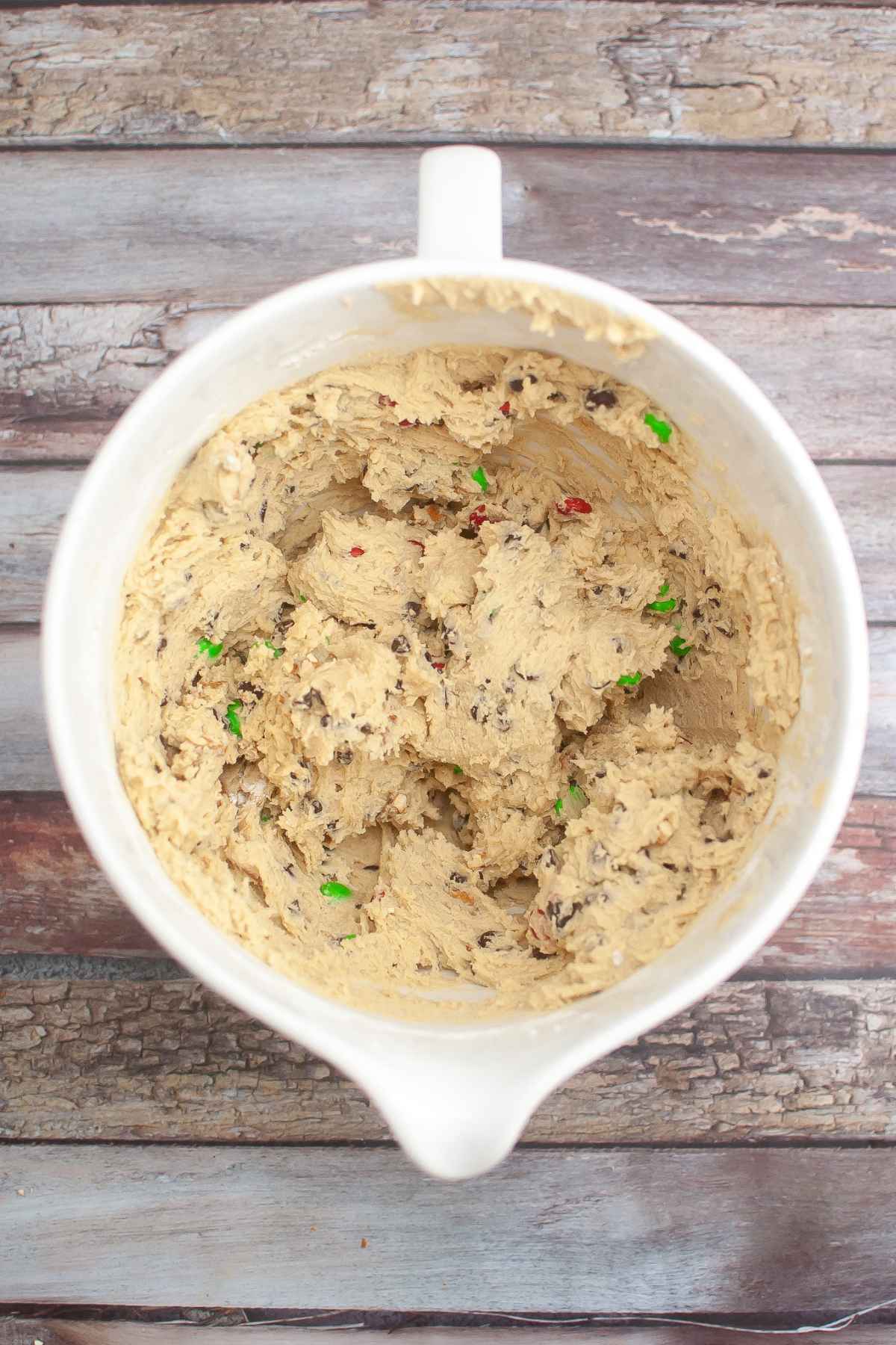 M&M Pretzel Cookie dough in a mixing bowl.