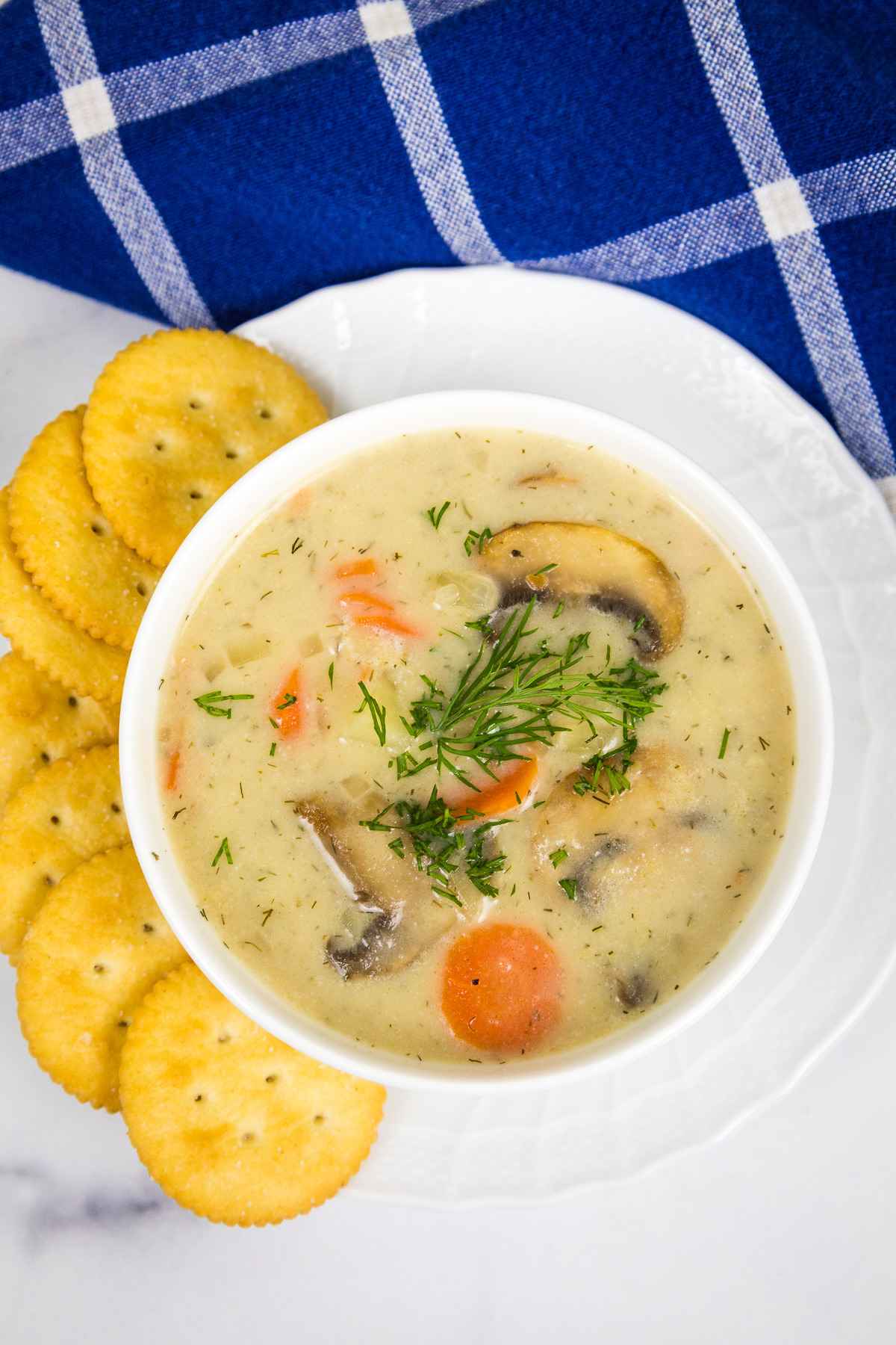 Overhead image of Russian Mushroom Potato Soup in a white bowl.