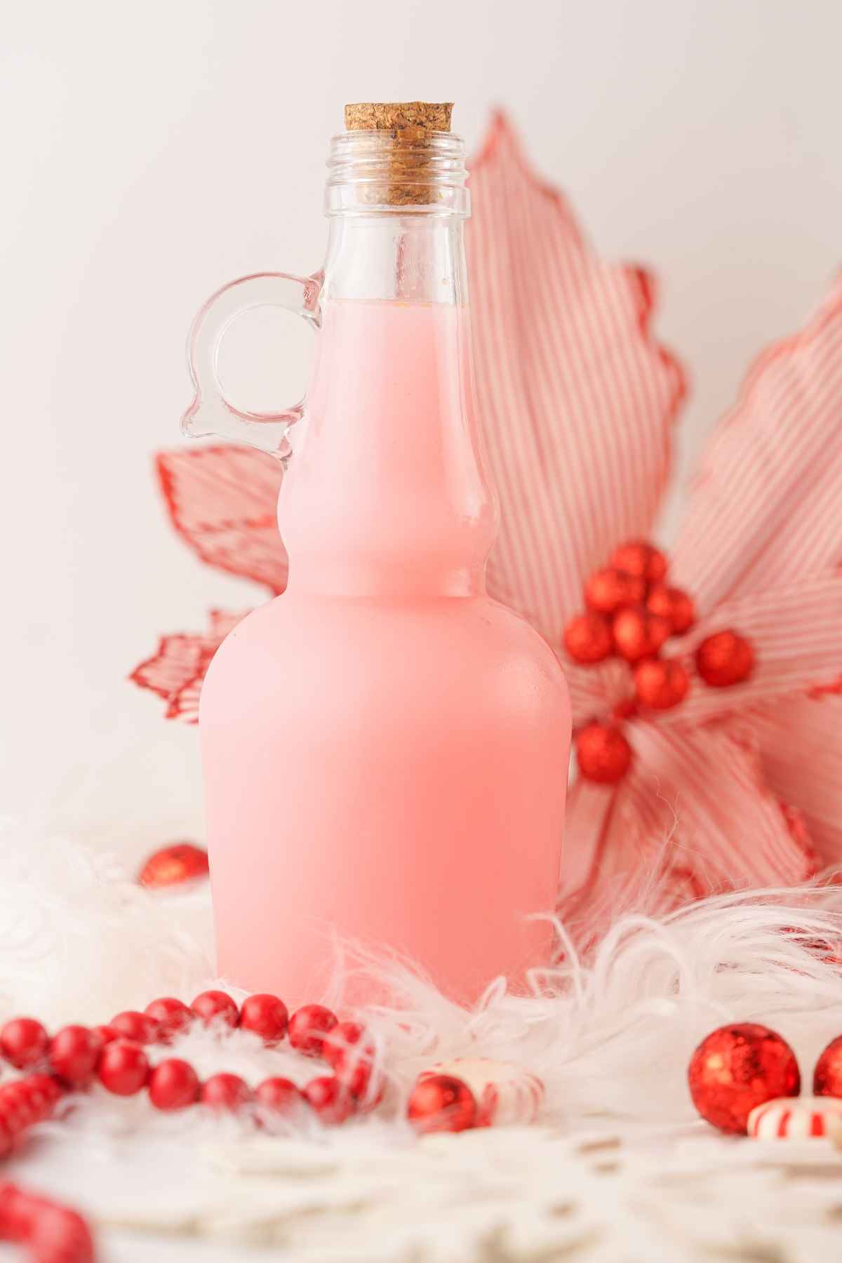 Featured image of Homemade Peppermint Vodka in a jug.