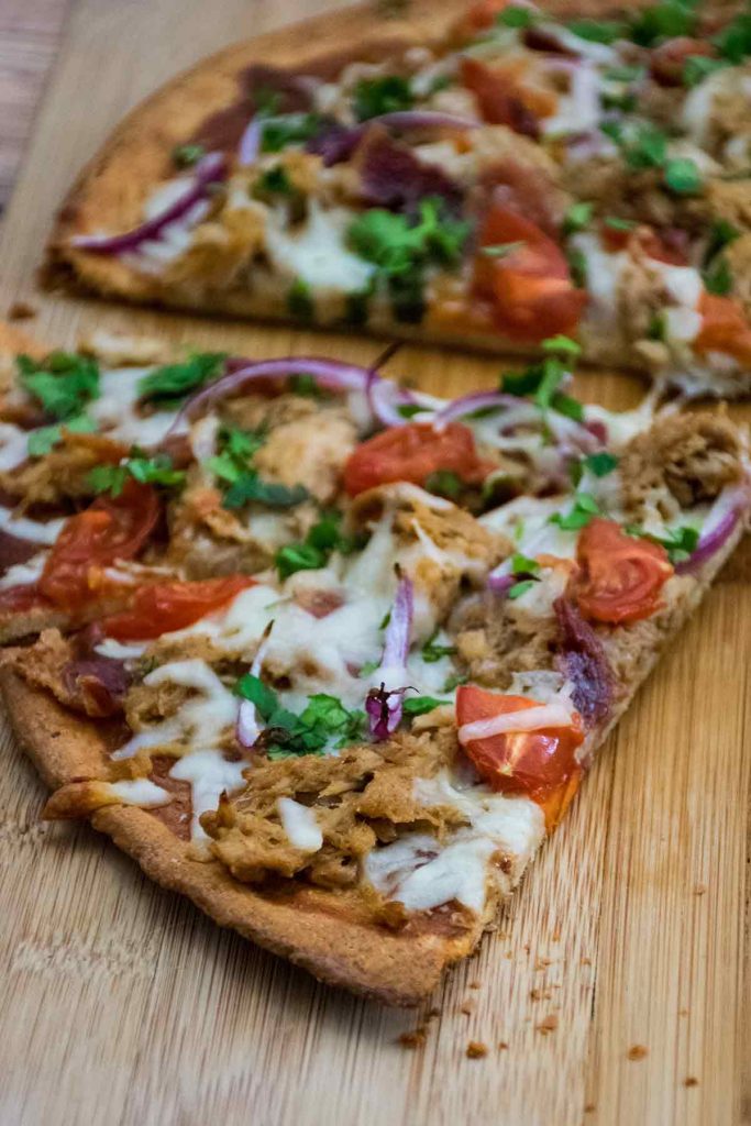 baked low carb pizza crust with pulled pork topping