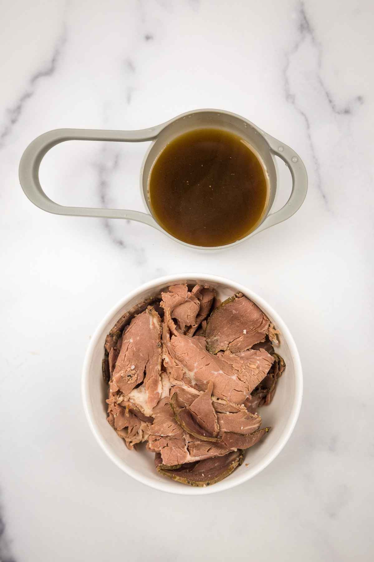 Deli beef and beef broth.