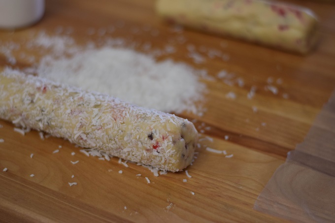 Cookie log with shredded coconut on the outside.