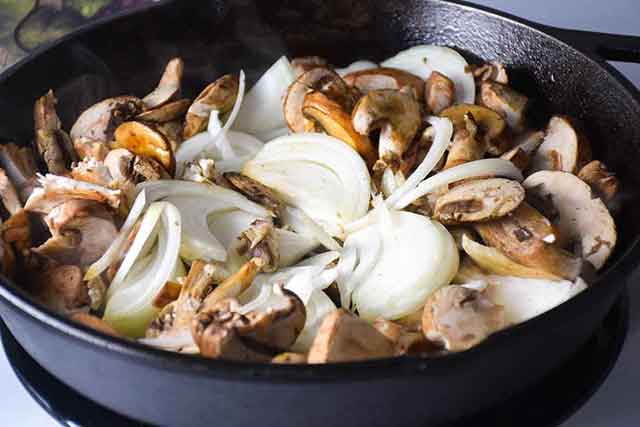 Sauteing onions and mushrooms in skillet