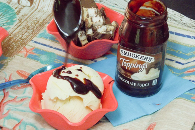 A spoon drizzling hot chocolate fudge over a scoop of ice cream.🥄 Equipment
Ice cream machine

Sharp knife

Medium saucepan: choose a pan with a heavy bottom

Hand whisk

Sieve

Freezer-safe container

🥫Storage
Freezer: store in a freezer safe airtight container up to 3 months

📖 Variations
Stir in 1 cup of your favorite add ins just prior to the churning step. You may like to try crushed cookies, chopped chocolate candies or chocolate chips, fresh strawberries
Pure vanilla extract or vanilla bean paste can be substituted for the vanilla bean pod.