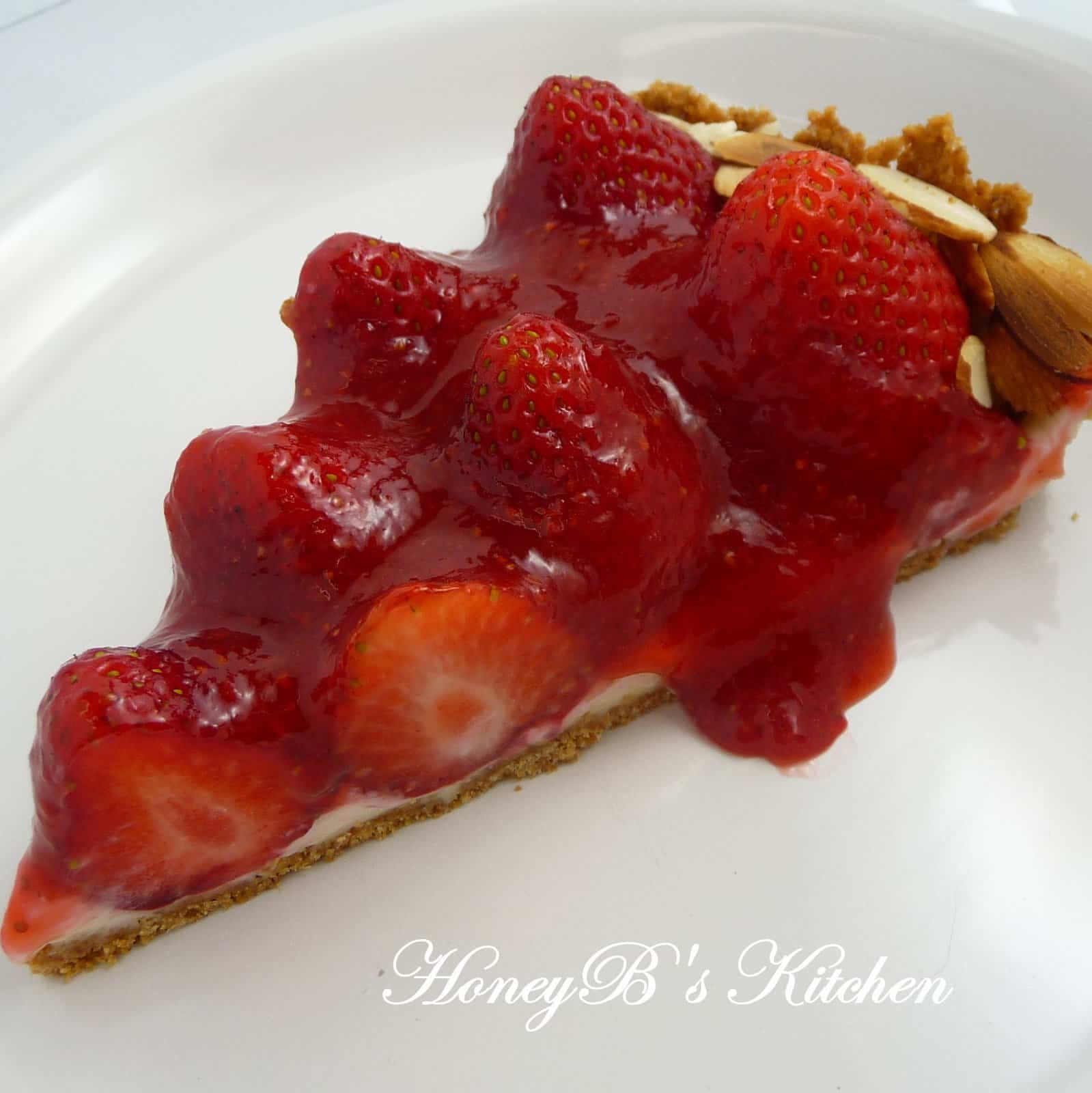 A slice of strawberry cream pie on a white plate.