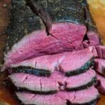 Featured image of whole sliced beef tenderloin.