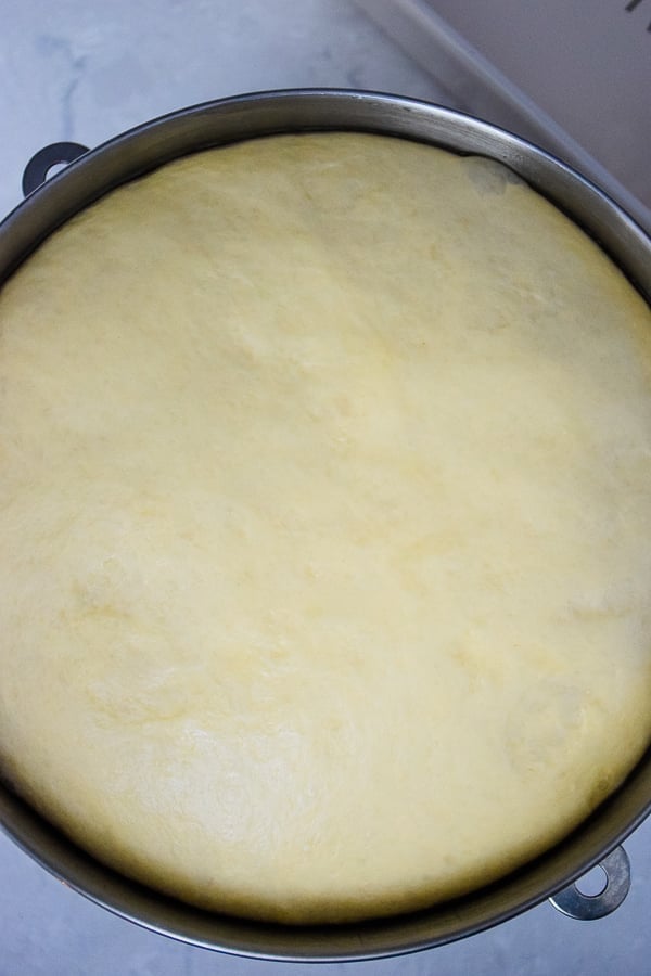 roll dough that has risen to the top of the bowl