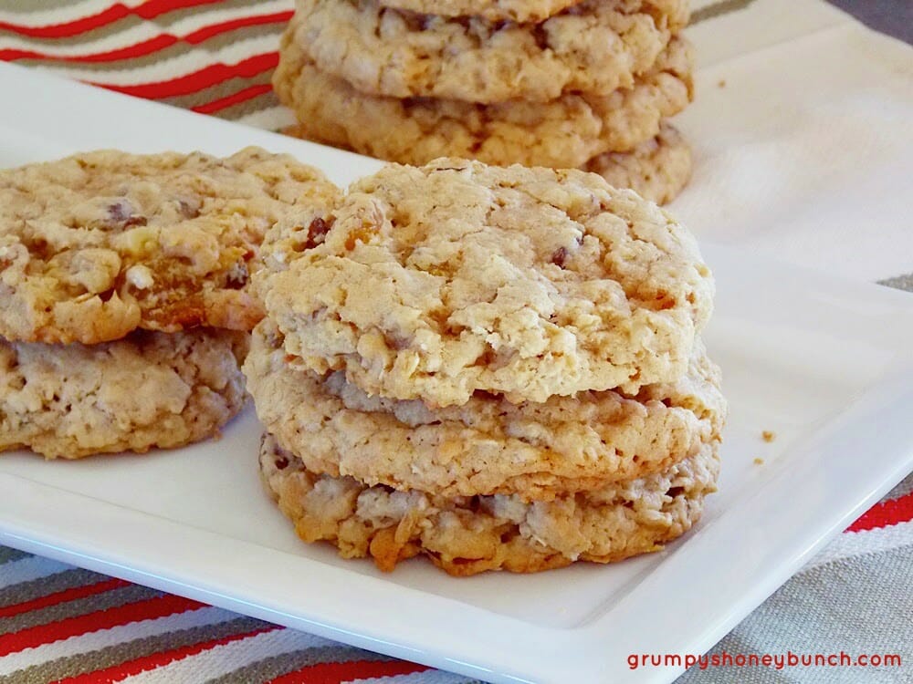 Cookies stacked on a white plate.