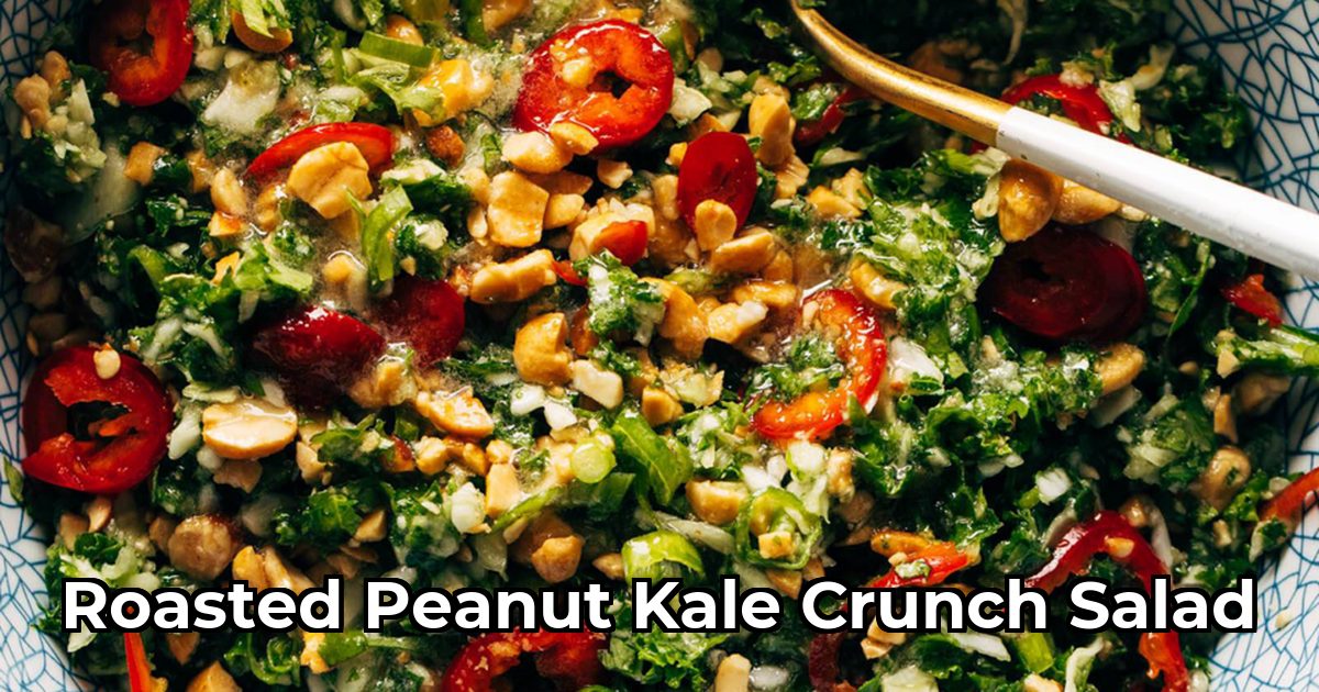 Shredded kale and cabbage salad with Fresno peppers and peanuts in a bowl with roasted peanut oil vinaigrette